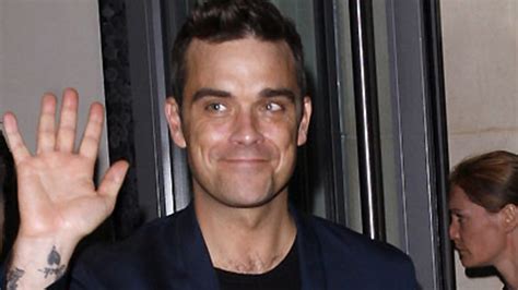 Is Robbie Williams a Modern-Day Wizard of Pop Music?